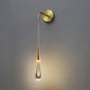 GOUTTES DE CRISTAL – TIMELESS CRYSTAL DROP DECORATIVE WALL LIGHT